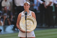 AP/Kin Cheung : Linda Noskova of Czech Republic poses with the trophy after winning to Karolina Muchova of Czech Republic in the women's singles final.