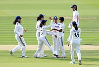 | Photo: Nigel French/PA via AP : India's Kranti Gaud (second right) celebrates with her team mates after taking the wicket of England's Tammy Beaumont, background right, during day one of the first Women's Rothesay Test between India and England at Lord's Cricket Ground in London, Friday, July 10, 2026. 