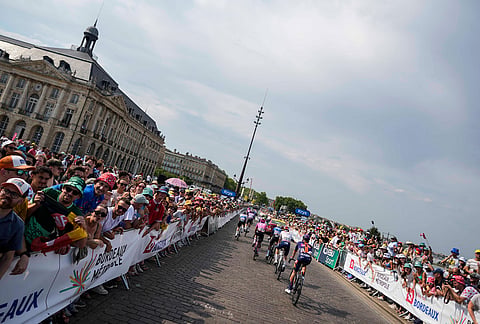 Riders approach the finish line during the seventh stage of the Tour de France cycling race over 175.1 kilometers (108.7 miles) with start in Hagetmau and finish in Bordeaux, France, Friday, July 10, 2026.