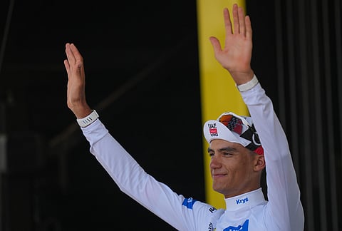 Mexico's Isaac Del Toro, wearing the best young rider's white jersey, celebrates on the podium after the seventh stage of the Tour de France cycling race with start in Hagetmau and finish in Bordeaux, France, Friday, July 10, 2026. 