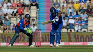 (AP Photo/Anthony Upton) : Jos Buttler of England, left, and Sanju Samson of India during the international T20 Cricket match between England and India in Southampton, England, Saturday, July 11, 2026
