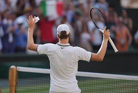Jannik Sinner of Italy celebrates winning against Novak Djokovic of Serbia in their men's singles semifinal match at the Wimbledon Tennis Championships in London, Friday, July 10, 2026.