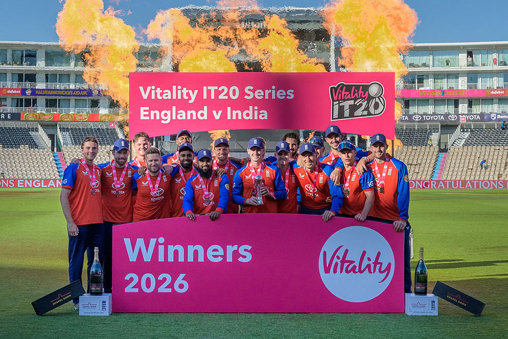 England T20 team celebrate after winning the Championship after the international T20 Cricket match between England and India In Southampton, England. - | Photo: AP/Anthony Upton