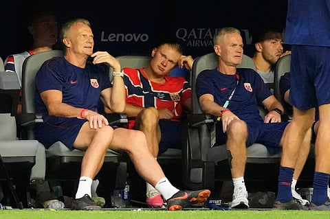 Norway's Erling Haaland (9) sits on the bench during the World Cup quarterfinal soccer match between Norway and England in Miami Gardens, Fla., Saturday, July 11, 2026.