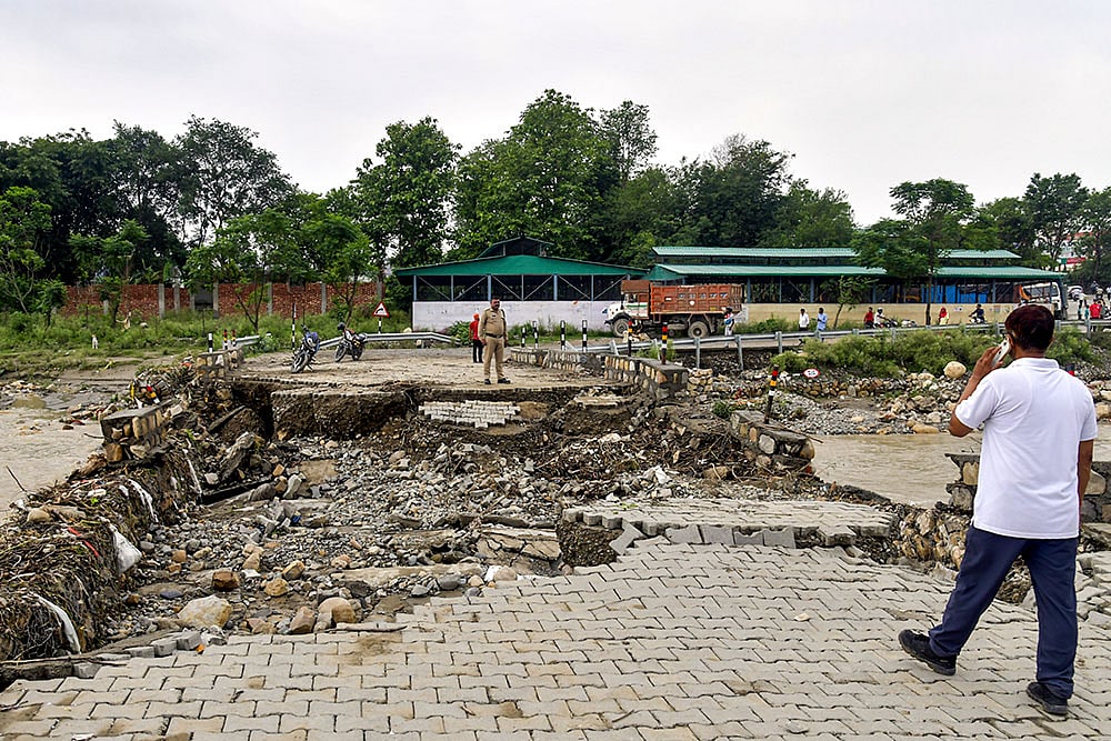 Portion of temporary bridge washes away in Dehradun