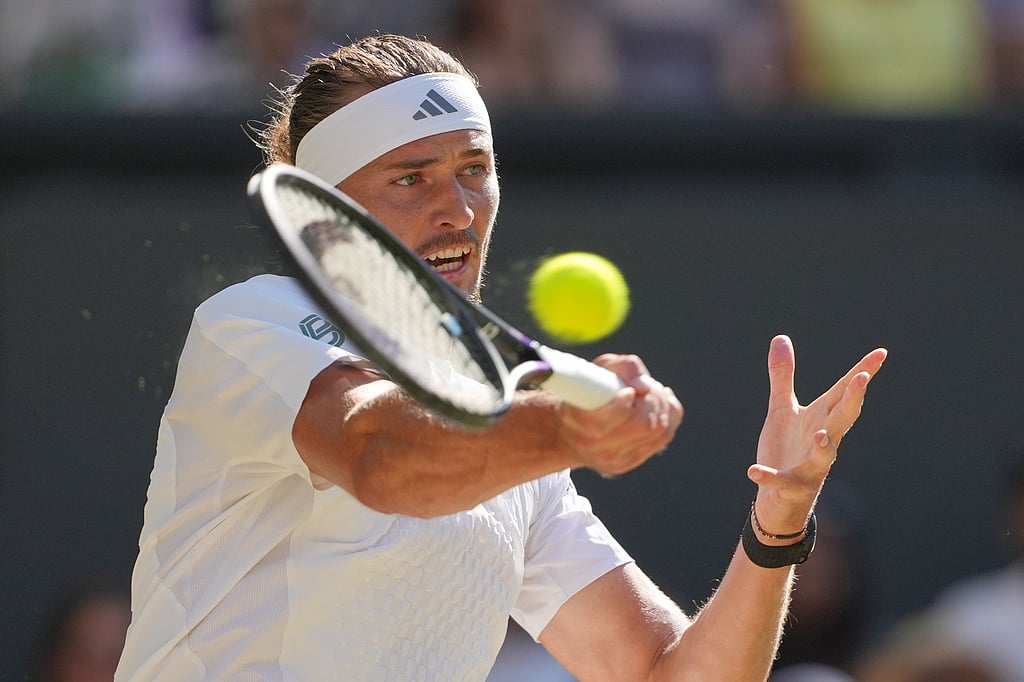 Alexander Zverev of Germany plays a return to Jannik Sinner of Italy during themens singles final at Wimbledon Tennis Championships in London