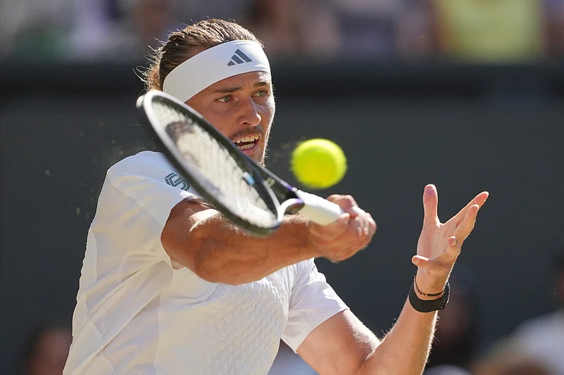 Alexander Zverev of Germany plays a return to Jannik Sinner of Italy during themens singles final at Wimbledon Tennis Championships in London