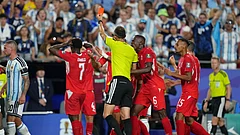 Referee Joao Pinheiro, of Portugal, gives a red card for Switzerland's Breel Embolo (7) during the World Cup quarterfinal soccer match between Argentina and Switzerland in Kansas City - Ed Zurga/AP Photo