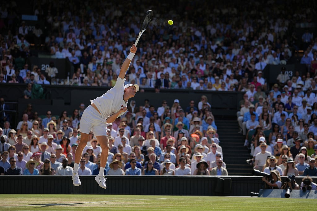 Jannik Sinner of Italy serves to Alexander Zverev of Germany during the mens singles final at Wimbledon Tennis Championships in London