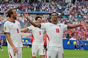 (AP Photo/Lynne Sladky) : England's Jude Bellingham, right, celebrates next to Harry Kane after scoring his side's second goal against Norway during the World Cup quarterfinal soccer match in Miami Gardens, Fla., Saturday, July 11, 2026.