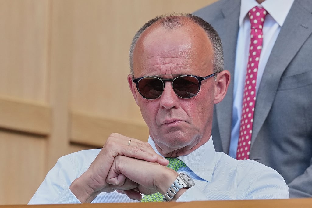 German Chancellor Friedrich Merz watches the mens singles final between Jannik Sinner of Italy and Alexander Zverev of Germany at Wimbledon Tennis Championships in London
