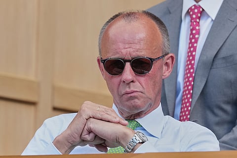 German Chancellor Friedrich Merz watches the men's singles final between Jannik Sinner of Italy and Alexander Zverev of Germany at Wimbledon Tennis Championships in London