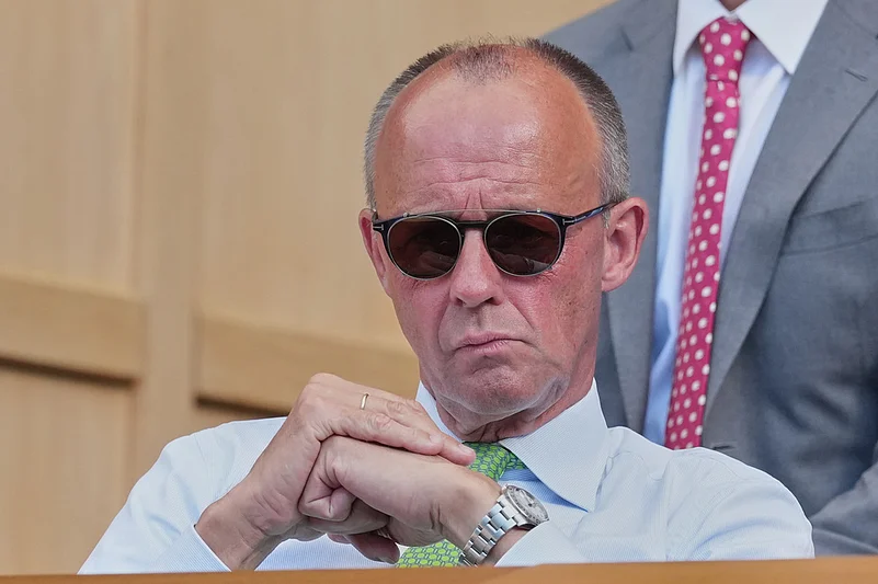 German Chancellor Friedrich Merz watches the mens singles final between Jannik Sinner of Italy and Alexander Zverev of Germany at Wimbledon Tennis Championships in London