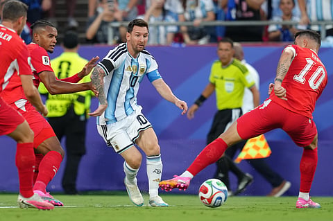 Argentina's Lionel Messi (10) battles for the ball with Switzerland's Granit Xhaka (10) during the World Cup quarterfinal soccer match between Argentina and Switzerland in Kansas City, Mo., Saturday, July 11, 2026