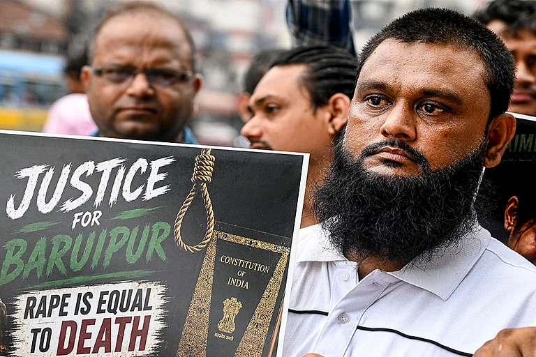 All India Majlis-e-Ittehadul Muslimeen (AIMIM) workers stage a protest over the alleged rape and murder of an 11-year-old girl in Baruipur, in Kolkata. - | Photo: PTI