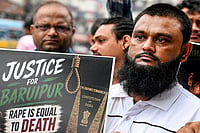 Day In Pics: July 12, 2026 | Photo: PTI : All India Majlis-e-Ittehadul Muslimeen (AIMIM) workers stage a protest over the alleged rape and murder of an 11-year-old girl in Baruipur, in Kolkata.