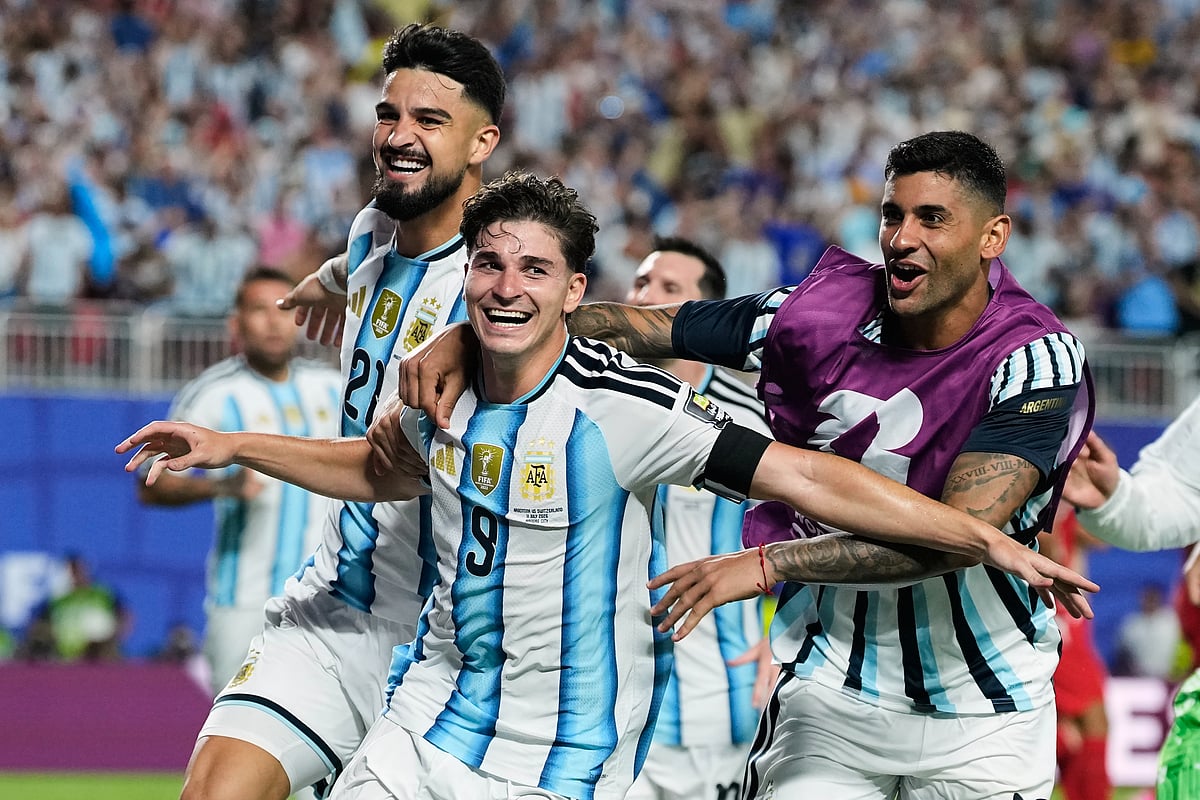 Argentina's Julian Alvarez (9) celebrates after scoring his side's second goal during the World Cup quarterfinal soccer match  - AP