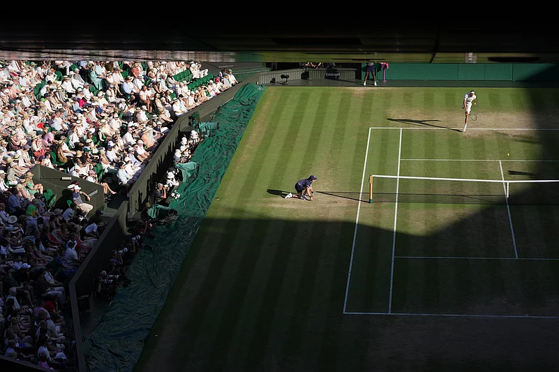 Alexander Zverev of Germany serves to Jannik Sinner of Italy in the mens singles final at Wimbledon Tennis Championships in London