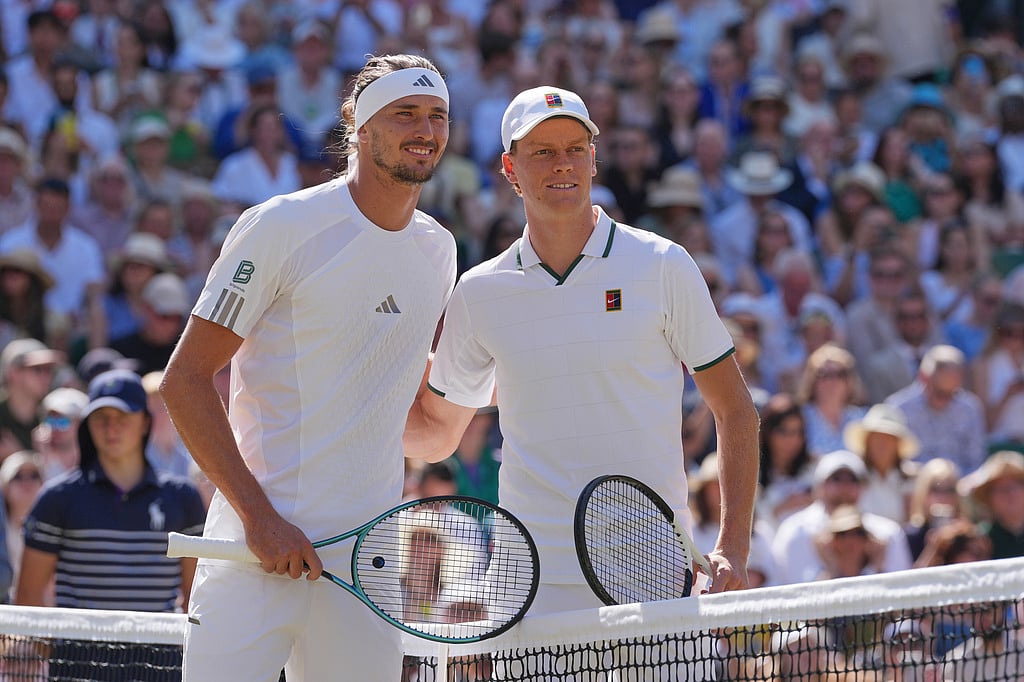 Alexander Zverev of Germany, left, and Jannik Sinner of Italy pose for a picture prior to the start of the mens singles final at Wimbledon Tennis Championships in London