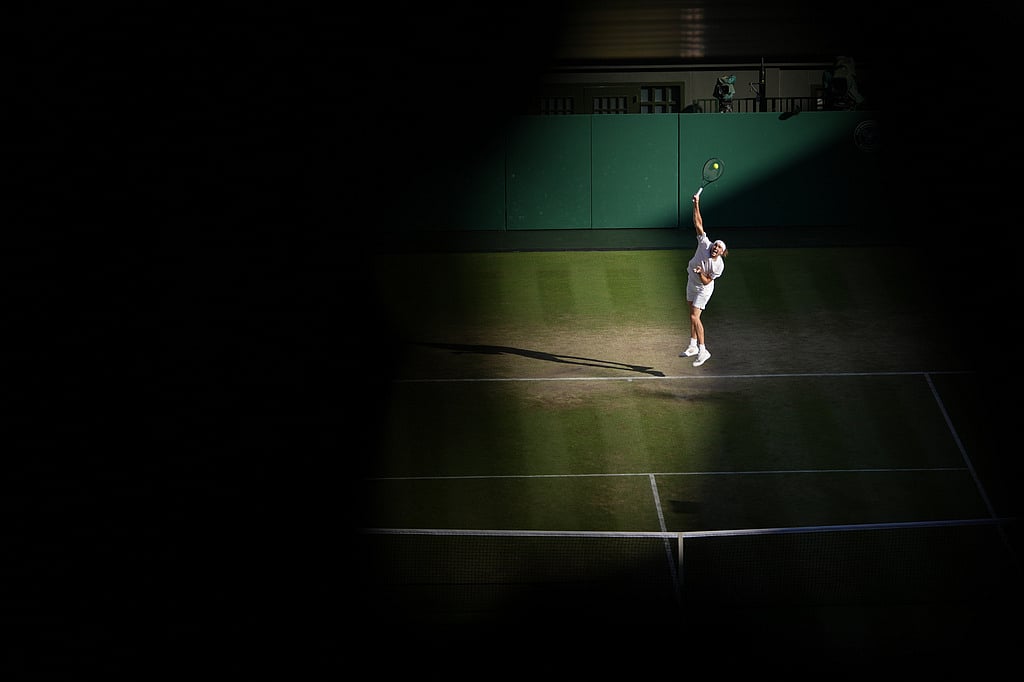 Alexander Zverev of Germany serves to Jannik Sinner of Italy in the mens singles final at Wimbledon Tennis Championships in London