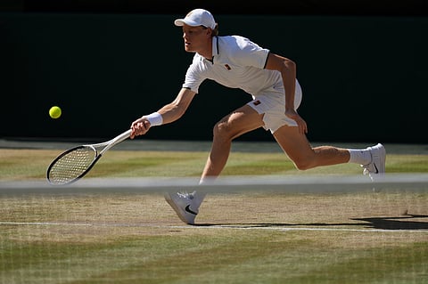 Jannik Sinner of Italy returns the ball to Alexander Zverev of Germany in the men's singles final at Wimbledon Tennis Championships in London
