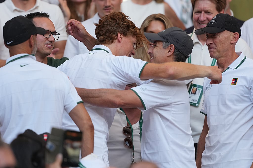 Jannik Sinner of Italy celebrates with is family and coaches after defeating Alexander Zverev of Germanyo win the mens singles final at Wimbledon Tennis Championships in London