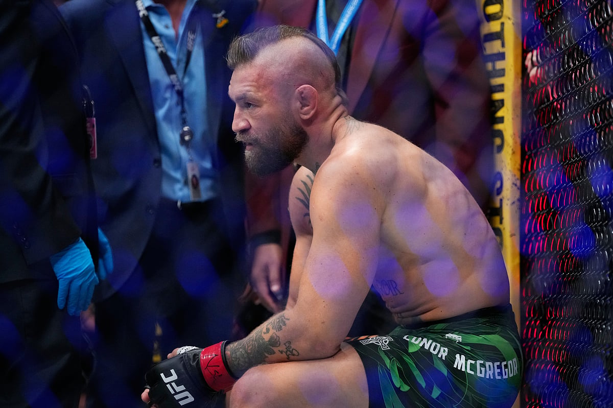 Conor McGregor reacts after losing to Max Holloway in a welterweight fight at the UFC 329 mixed martial arts event Saturday - AP/John Locher