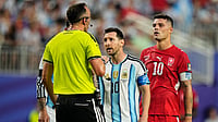 AP : FIFA World Cup 2026, Argentina vs Switzerland Live Score Today: Argentina's Lionel Messi (10), talks to referee Joao Pinheiro, left, of Portugal, during the World Cup quarterfinal soccer match