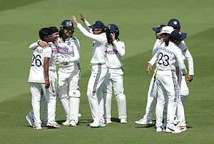 | Photo: Steven Paston/PA via AP : India's players celebrate the wicket of England's Amy Jones, who was caught out by Shafali Verma during day four of the first Women's Rothesay Test between England and India in London, England, Monday, July 13, 2026.