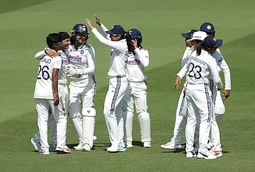 | Photo: Steven Paston/PA via AP : India's players celebrate the wicket of England's Amy Jones, who was caught out by Shafali Verma during day four of the first Women's Rothesay Test between England and India in London, England, Monday, July 13, 2026.
