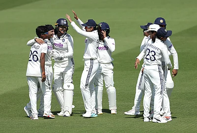 | Photo: Steven Paston/PA via AP : Indias players celebrate the wicket of Englands Amy Jones, who was caught out by Shafali Verma during day four of the first Womens Rothesay Test between England and India in London, England, Monday, July 13, 2026.