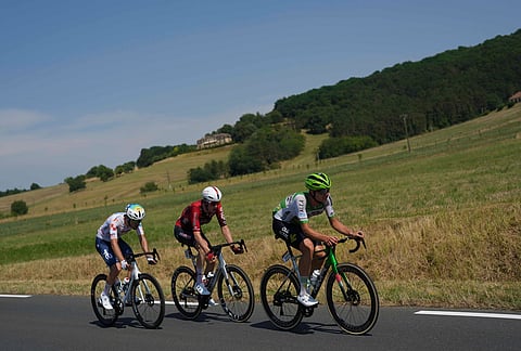 Breakaway riders race during the eighth stage of the Tour de France cycling race with start in Perigueux and finish in Bergerac, France, Saturday, July 11, 2026. 