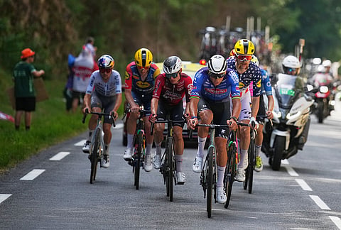 Netherland's Mathieu van der Poel leads the break away during the ninth stage of the Tour de France cycling race with start in Malemort and finish in Ussel, France, Sunday, July 12, 2026.