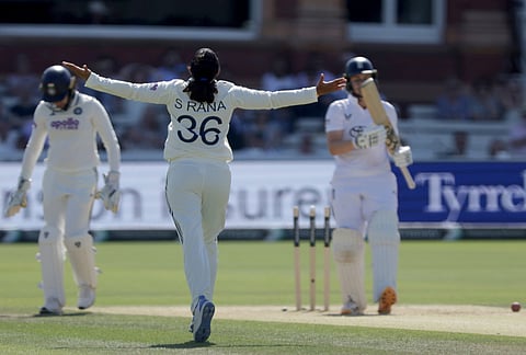 India's Sneh Rana, center, celebrates bowling England's Nat Sciver-Brunt, right, during day three of the first Women's Test match at Lord's cricket ground in London, Sunday July 12, 2026. 