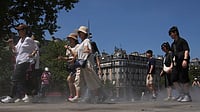 | Photo: AP/Christophe Ena : Europe Records 10,000 Excess Deaths Due To Heatwave