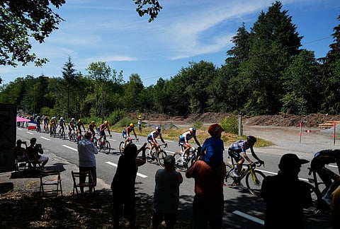 The pack rides during the ninth stage of the Tour de France cycling race with start in Malemort and finish in Ussel, France.