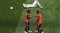 | Photo: AP/ Marcio J. Sanchez : Spain's Lamine Yamal (19) and Nico Williams (17) celebrate in front of Belgium's Joaquin Seys (18) after the World Cup quarterfinal soccer match between Spain and Belgium in Inglewood, Calif., near Los Angeles, Friday, July 10, 2026. 