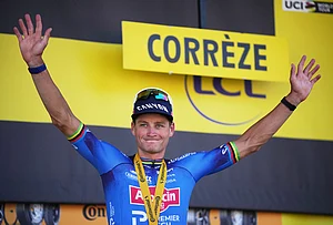 | Photo: AP/Mosa'ab Elshamy : Netherland's Mathieu van der Poel celebrates on the podium after winning the ninth stage of the Tour de France cycling race with start in Malemort and finish in Ussel, France, Sunday, July 12, 2026.