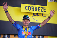 Tour De France 2026 Stage 9: Mathieu Van Der Poel Claims Victory In Heat-Shortened Race | Photo: AP/Mosa'ab Elshamy : Netherland's Mathieu van der Poel celebrates on the podium after winning the ninth stage of the Tour de France cycling race with start in Malemort and finish in Ussel, France, Sunday, July 12, 2026.