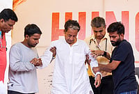 | Photo: PTI/Ravi Choudhary : Climate activist Sonam Wangchuk being assisted by a medical professional and Cockroach Janata Party (CJP) founder Abhijeet Dipke during a hunger strike by CJP demanding action over alleged irregularities in examinations and seeking the resignation of Union Education Minister Dharmendra Pradhan, at Jantar Mantar, in New Delhi. Wangchuk is on the 16th day of his indefinite hunger strike. 