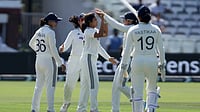 | Photo: Steven Paston/PA via AP : India's Sayali Satghare, center, celebrates with her teammates after taking the wicket of England's Maia Bouchier during day three of the first Women's Test match at Lord's cricket ground in London.