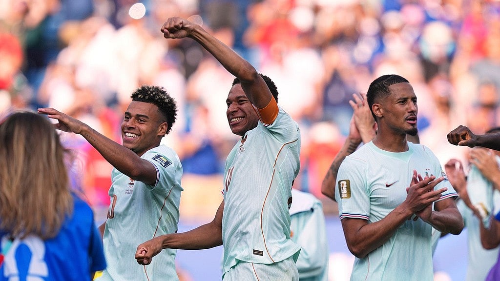 France's Kylian Mbappe, center, celebrates with teammates after France defeated Morocco during the World Cup quarterfinal soccer match between France and Morocco in Foxborough - Martin Meissner/AP Photo