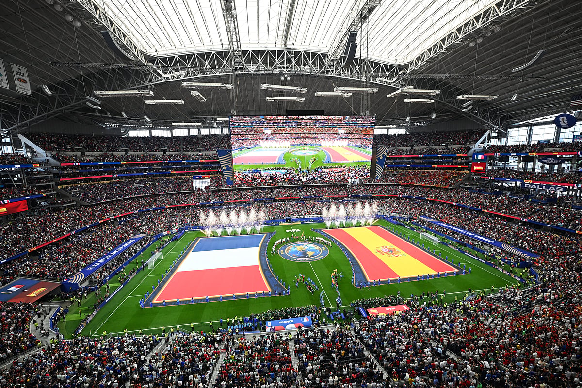 The flags of France, left, and Spain are displayed before the World Cup semifinal soccer match in Arlington - AP/Jessica Tobias