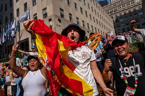 Spanish fans react as they watch a broadcast of the World Cup semifinal soccer match between France and Spain, Tuesday, July 14, 2026.