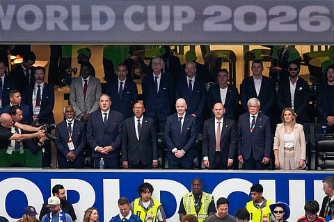 Fifa President Gianni Infantino, center, watches prior to the World Cup semifinal soccer match between France and Spain