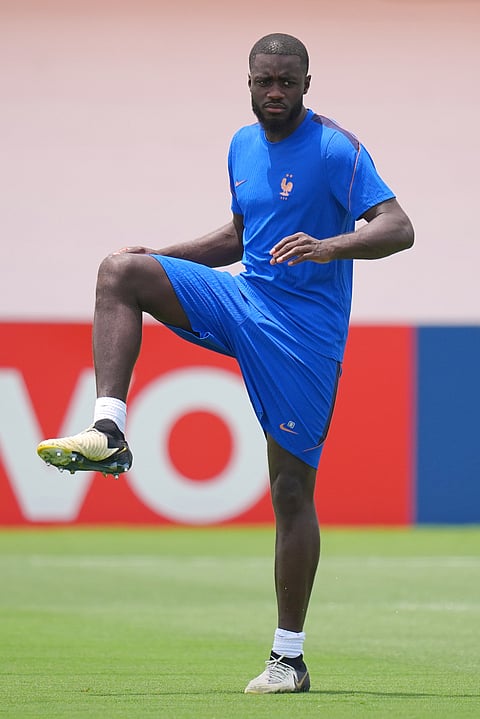 France's Dayot Upamecano participates in a training session ahead of the team's semifinal soccer match against Spain