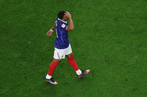 France's Kylian Mbappe (10) reacts during the World Cup semifinal soccer match between France and Spain in Arlington, Texas, near Dallas, Tuesday