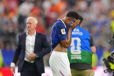 France's Kylian Mbappe walks of the field after his side's lost in a World Cup semifinal soccer match against Spain in Arlington