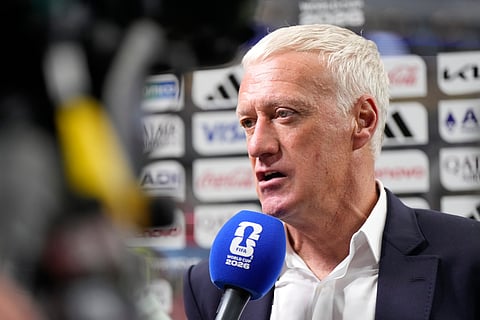 France head coach Didier Deschamps gives an interview on the pitch at the the end of the World Cup semifinal soccer match