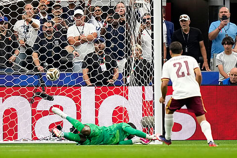 Spain's Mikel Oyarzabal scores the opening goal from the penalty spot past France goalkeeper Mike Maignan